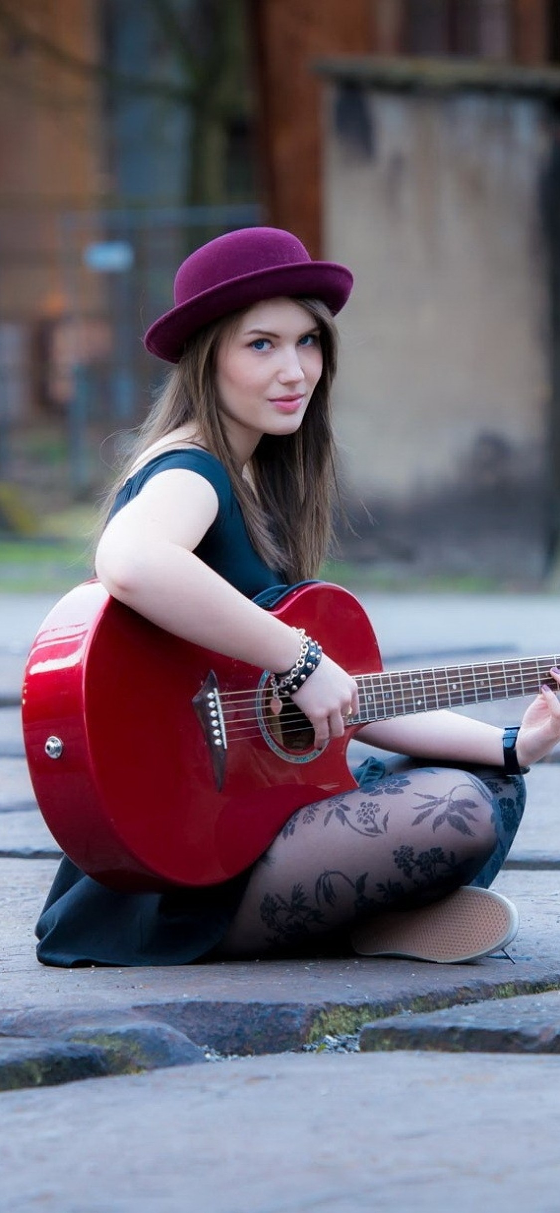 Best-girl-sitting-red-guitar-iPhone-x-wallpaper